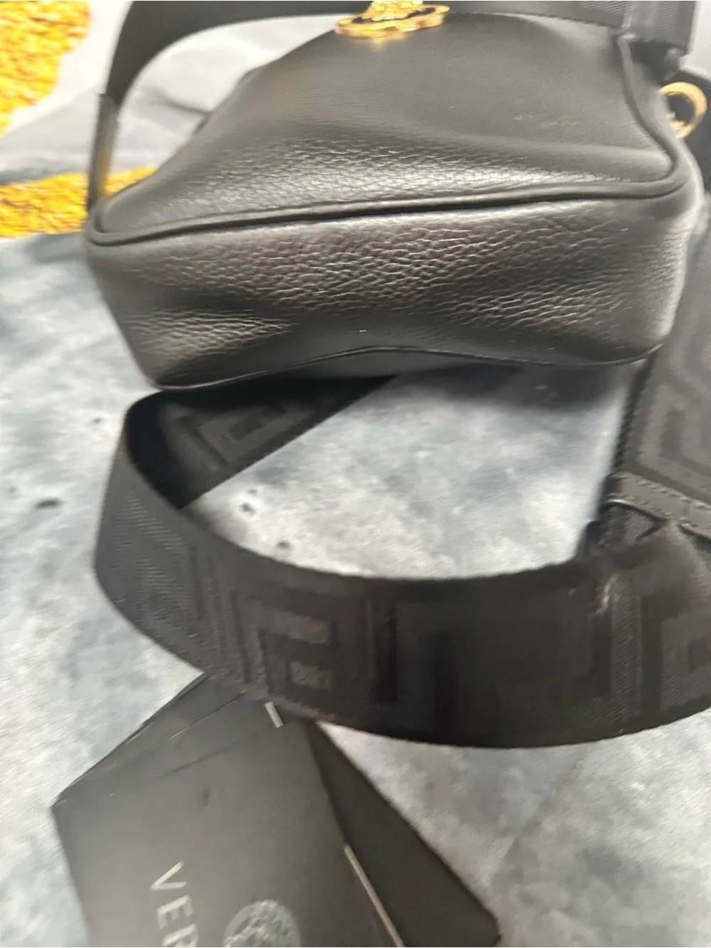 Versace Black Leather Messenger Bag with Gold Medusa Accent